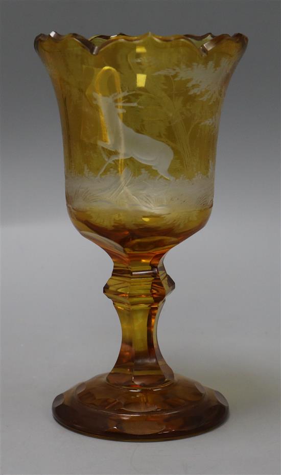 A 19th century bohemian amber glass flash cut goblet H.21cm